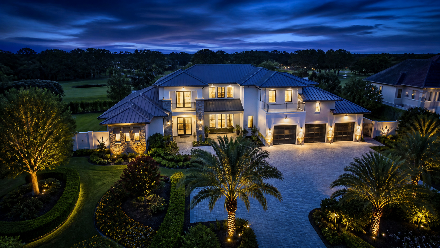 Aerial view of a luxury home at blue hour